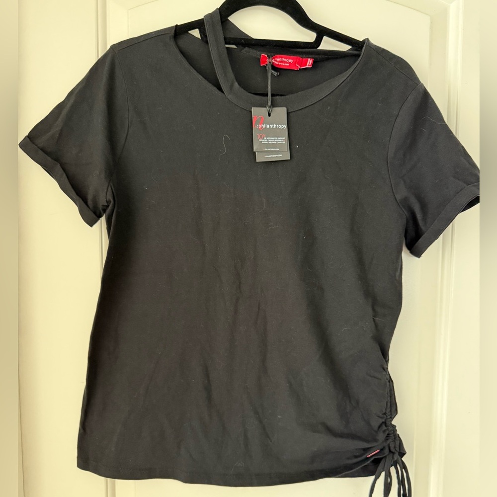 Cotton T-shirt with ripped neck line, and side tie